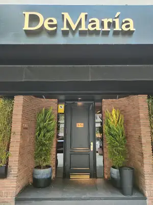 De María